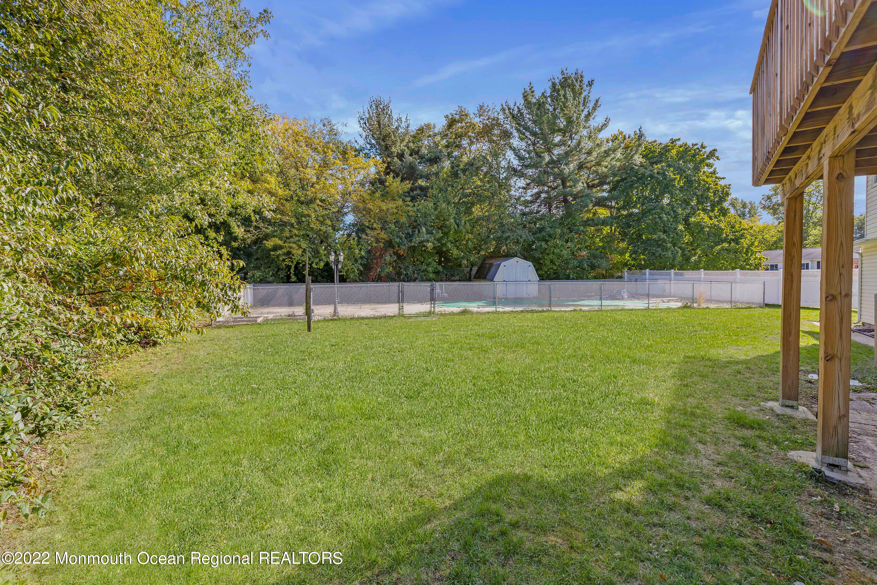 37 Westbrook Road Howell, NJ 07731 - Photo 32 of 39 a view of yard with trampoline