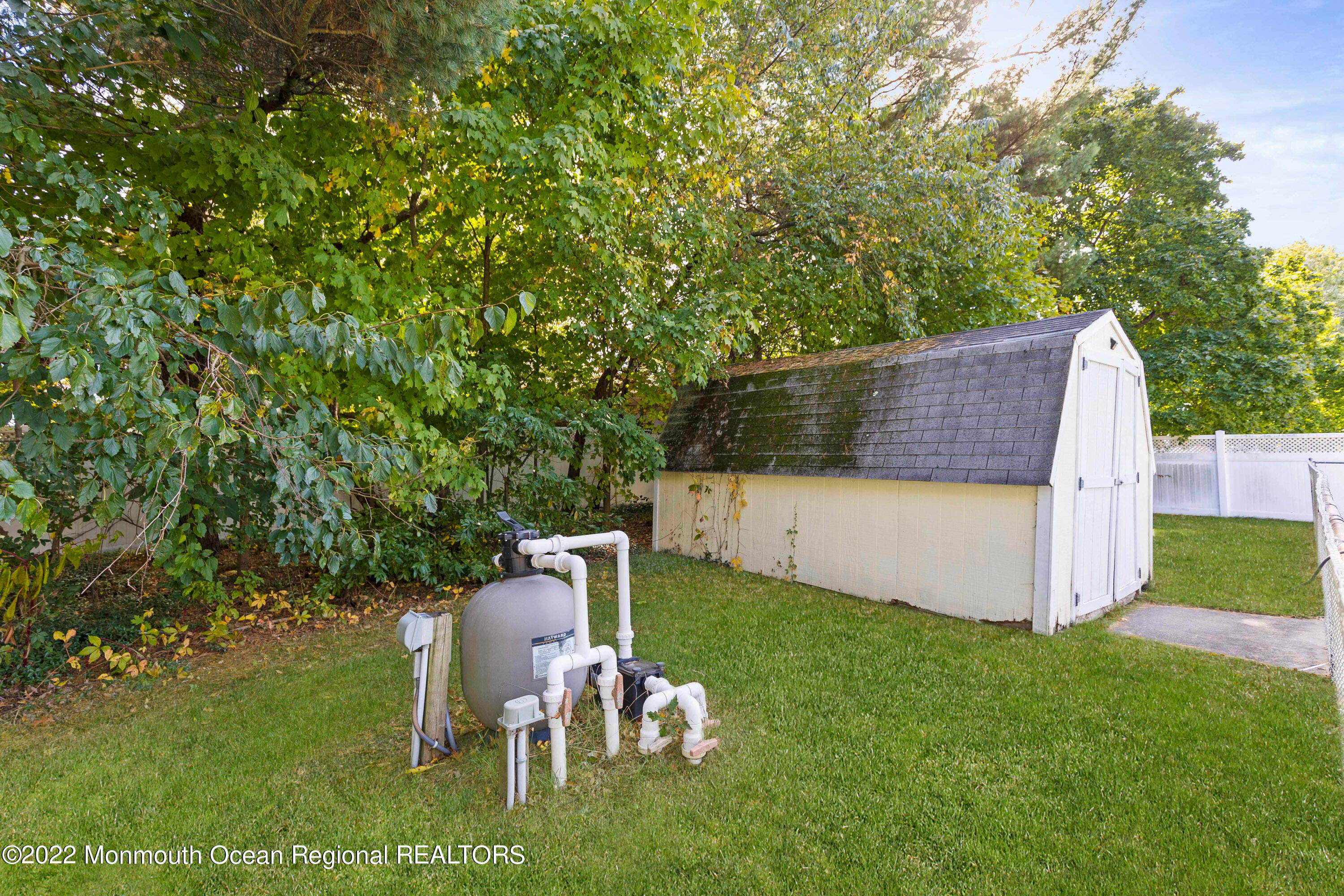 37 Westbrook Road Howell, NJ 07731 - Photo 36 of 39 a view of a backyard with chairs