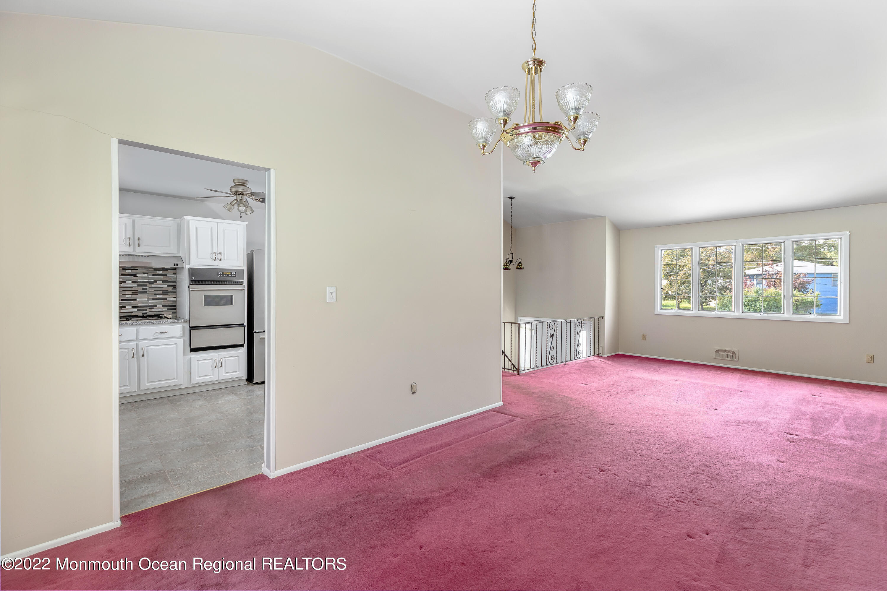 37 Westbrook Road Howell, NJ 07731 - Photo 8 of 39 wooden floor in an empty room with a window