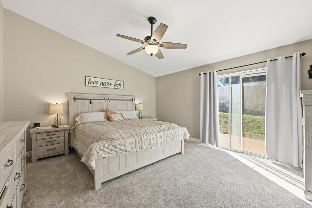 13638 West Oak Glen Road Valley Center, CA 92082 - Photo 4 of 30 a bedroom with a bed and window