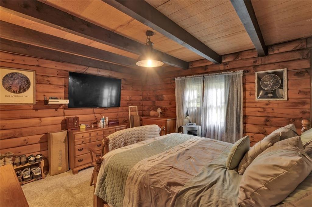 1270 Old State Road Apollo, PA 15613 - Photo 26 of 36 a bedroom with a bed and a flat screen tv