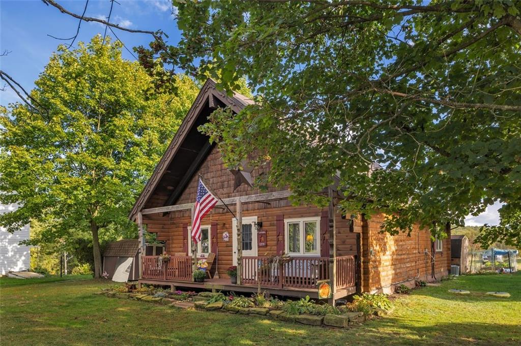 1270 Old State Road Apollo, PA 15613 - Photo 3 of 36 a front view of a house with a garden