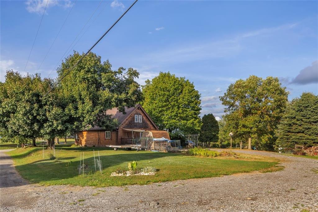 1270 Old State Road Apollo, PA 15613 - Photo 7 of 36 a front view of a house with a yard