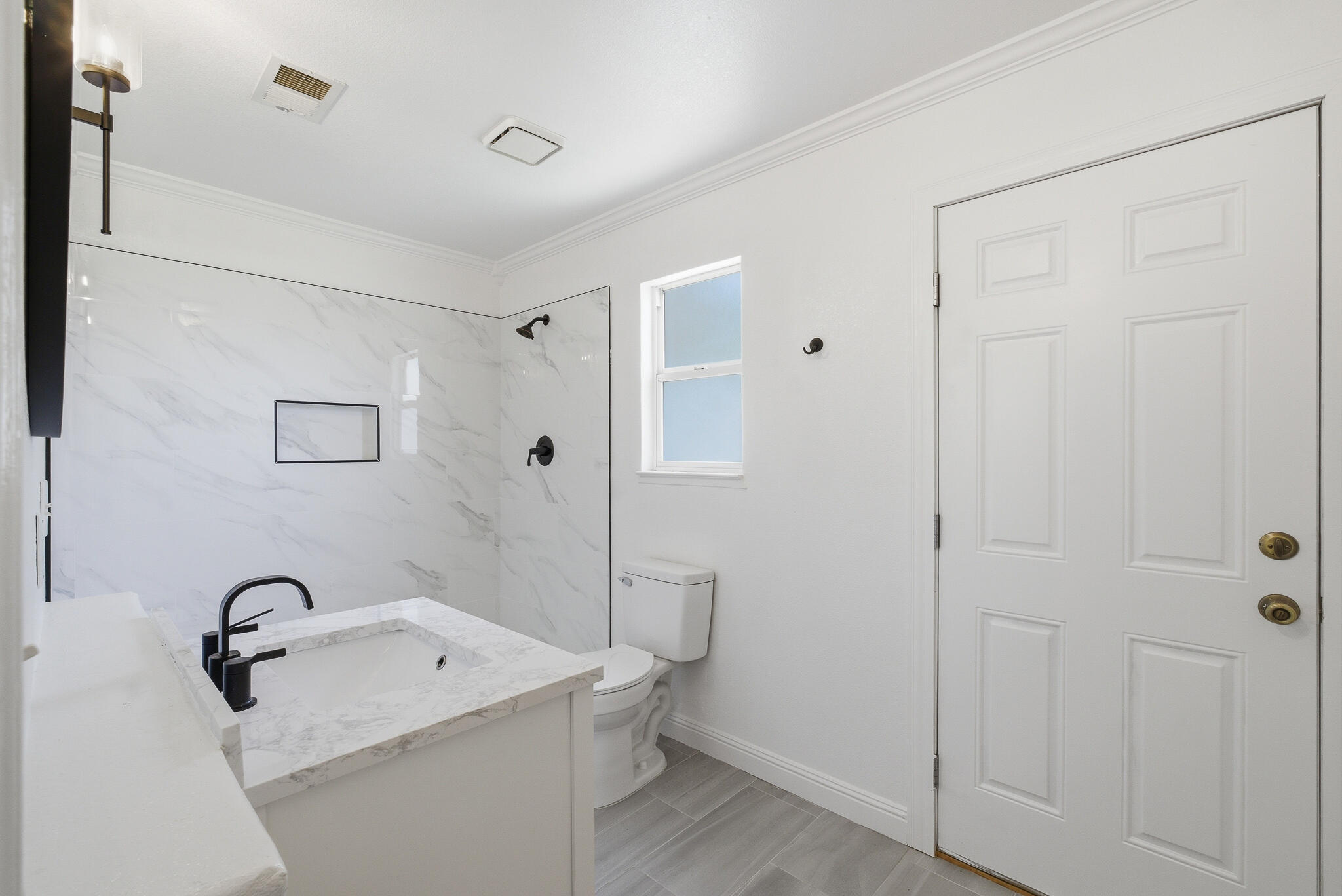 618 Birdsong Court Exeter, CA 93221 - Photo 34 of 62 a bathroom with a sink a toilet and shower
