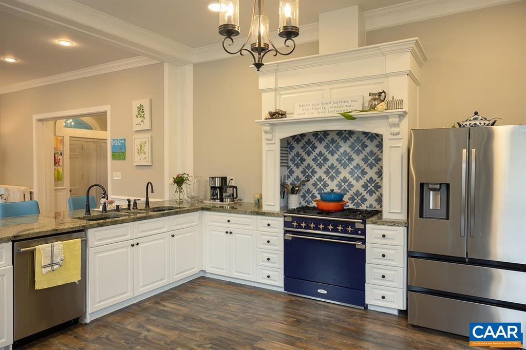 409 Park Street Charlottesville, VA 22902 - Photo 11 of 58 a kitchen with stainless steel appliances a stove and cabinets
