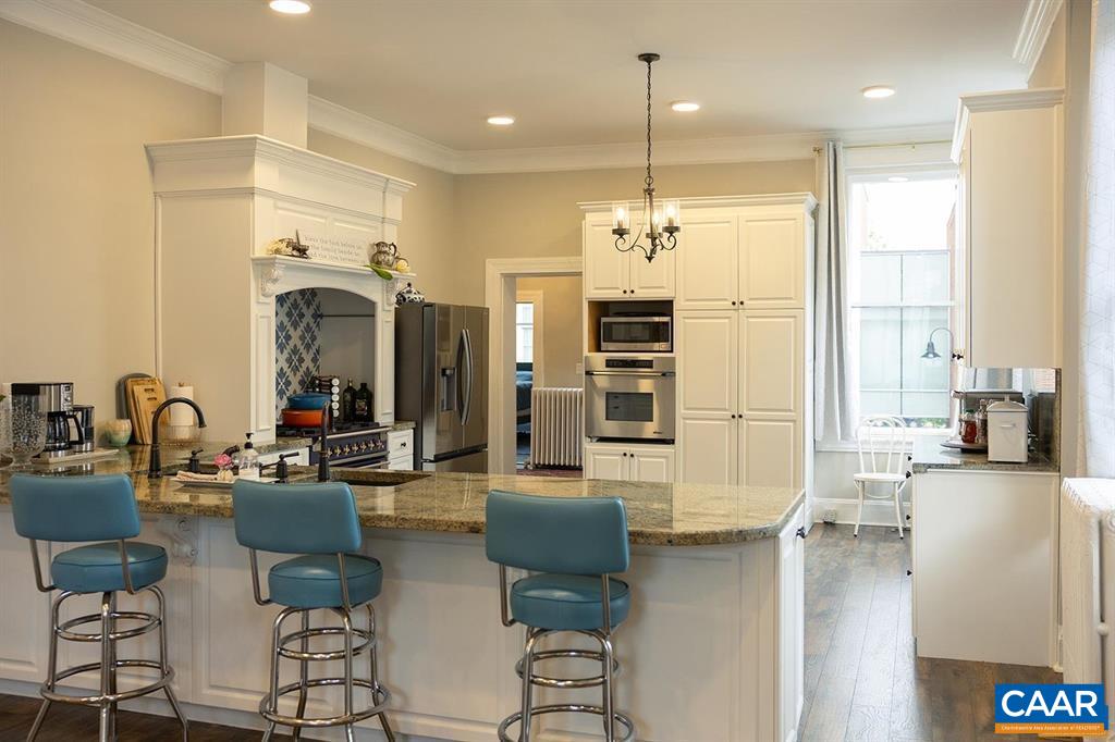 409 Park Street Charlottesville, VA 22902 - Photo 13 of 58 a living room with fireplace furniture and a large window