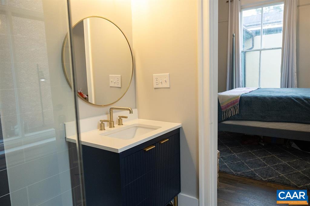 409 Park Street Charlottesville, VA 22902 - Photo 19 of 58 a en suite bathroom with a sink and a mirror