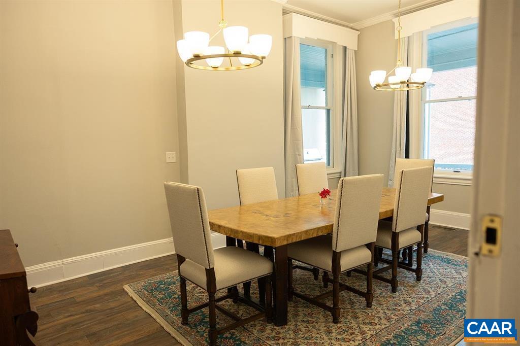409 Park Street Charlottesville, VA 22902 - Photo 25 of 58 a view of a dining room with furniture and wooden floor