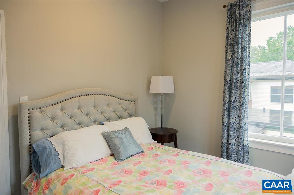 409 Park Street Charlottesville, VA 22902 - Photo 39 of 58 a bedroom with a bed and a window