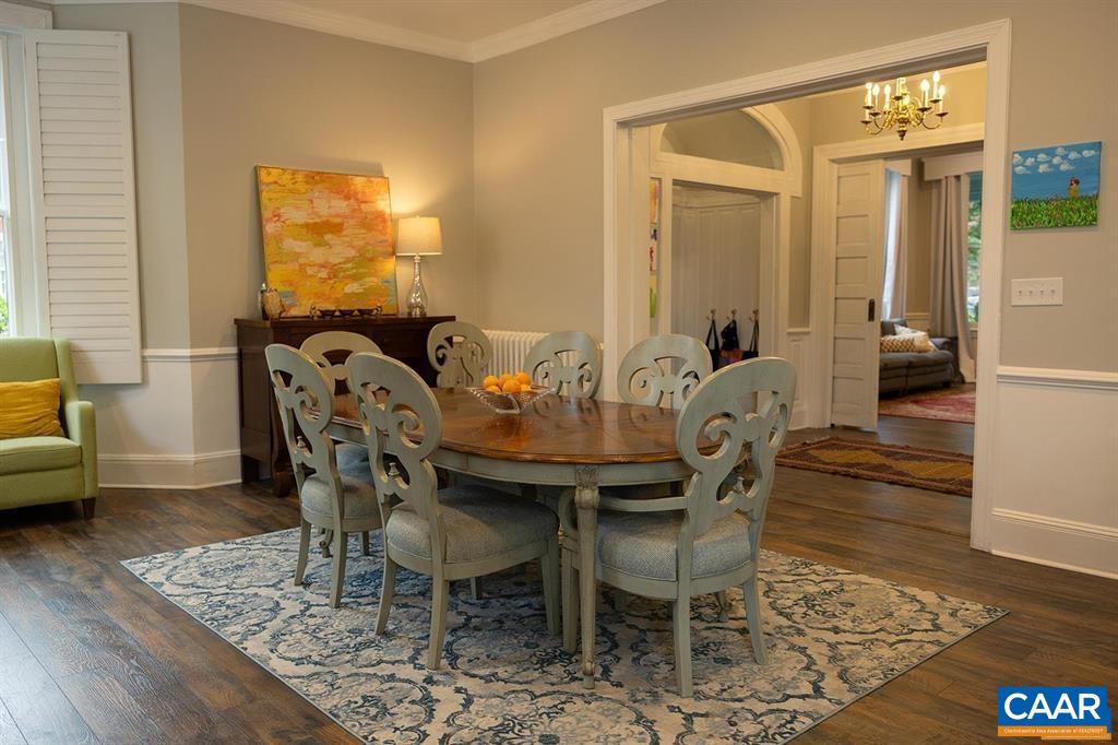 409 Park Street Charlottesville, VA 22902 - Photo 7 of 58 a view of a dining room with furniture and wooden floor