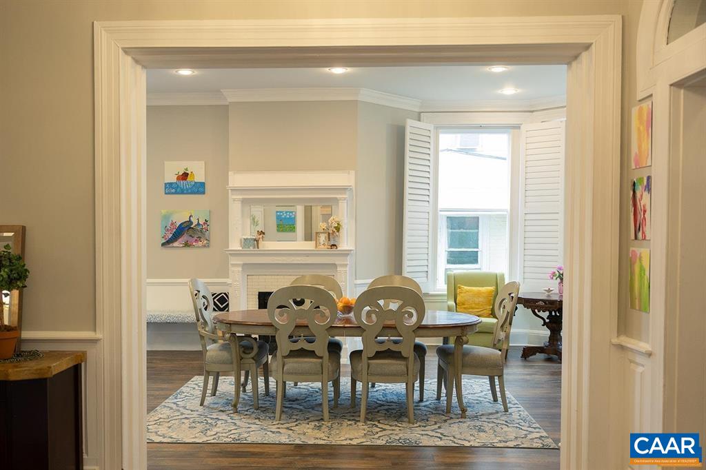 409 Park Street Charlottesville, VA 22902 - Photo 10 of 58 a view of a dining room with furniture and chandelier