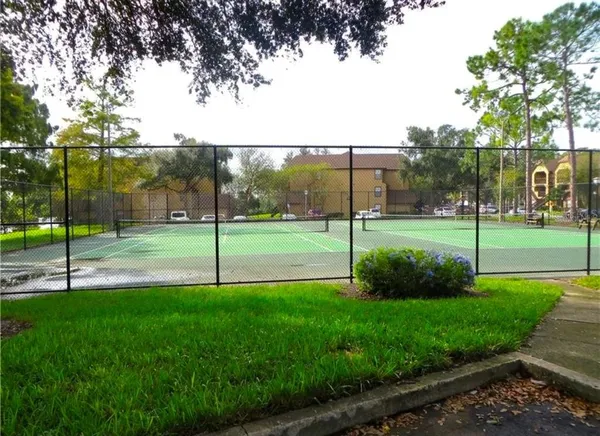 a view of a park and entertaining space