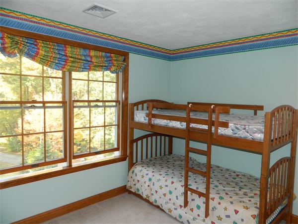 41 Highland Road Boxford, MA 01921 - Photo 11 of 18 a bedroom with furniture and a window
