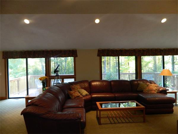 41 Highland Road Boxford, MA 01921 - Photo 3 of 18 a living room with furniture and a large window