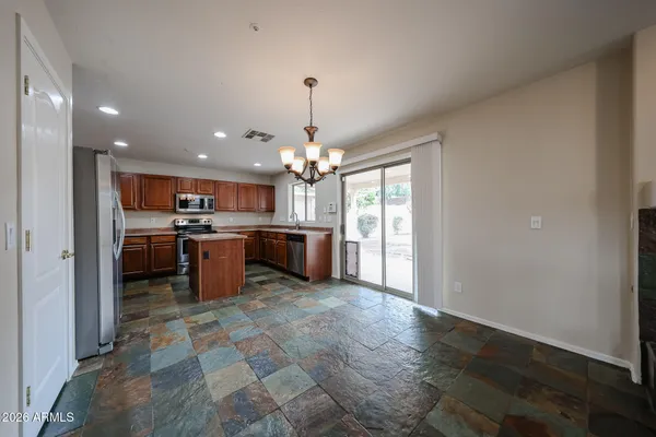 a kitchen with sink cabinets and window