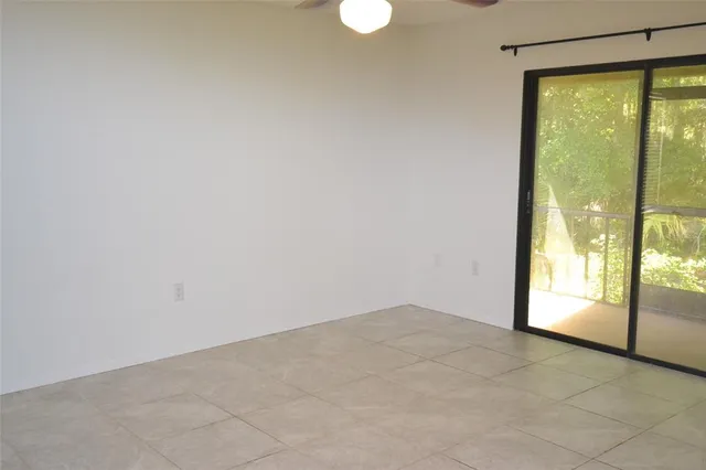 a view of an empty room with window