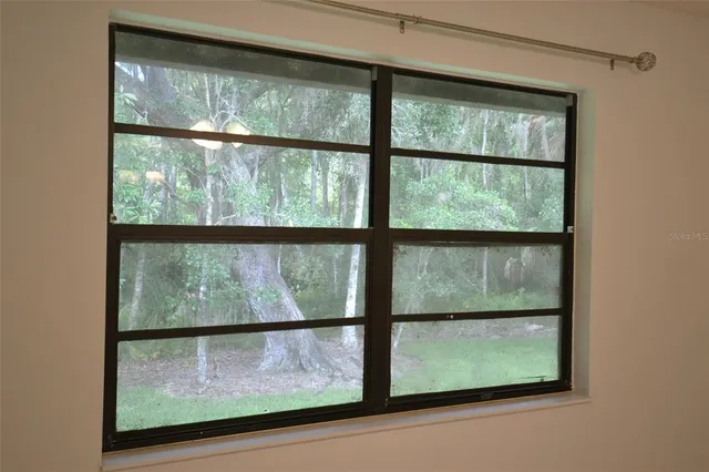 a view of a room that has a window