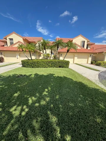 a view of houses with yard