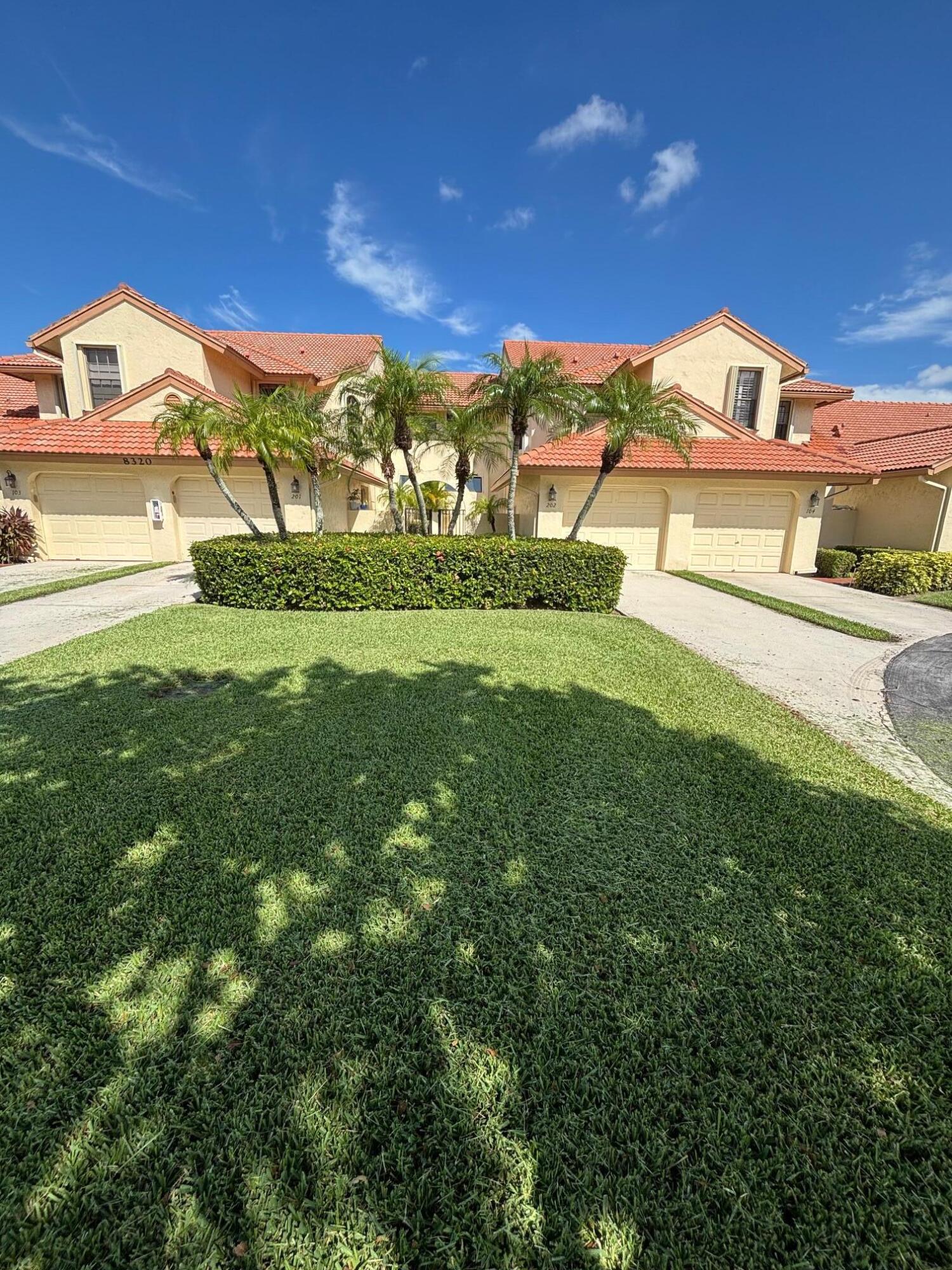 a view of houses with yard