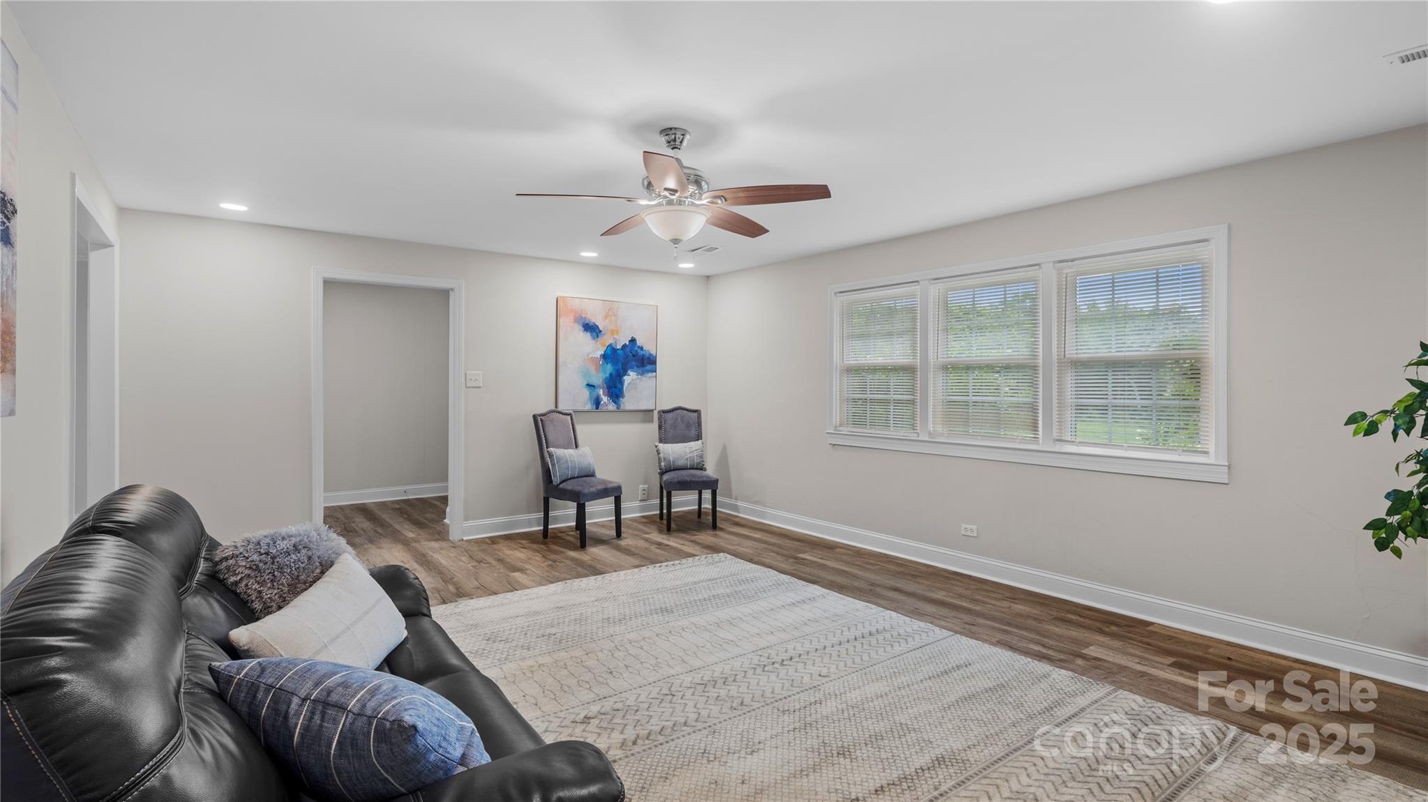 7860 Henry Harris Road Fort Mill, SC 29707 - Photo 13 of 31 a living room with furniture and a window