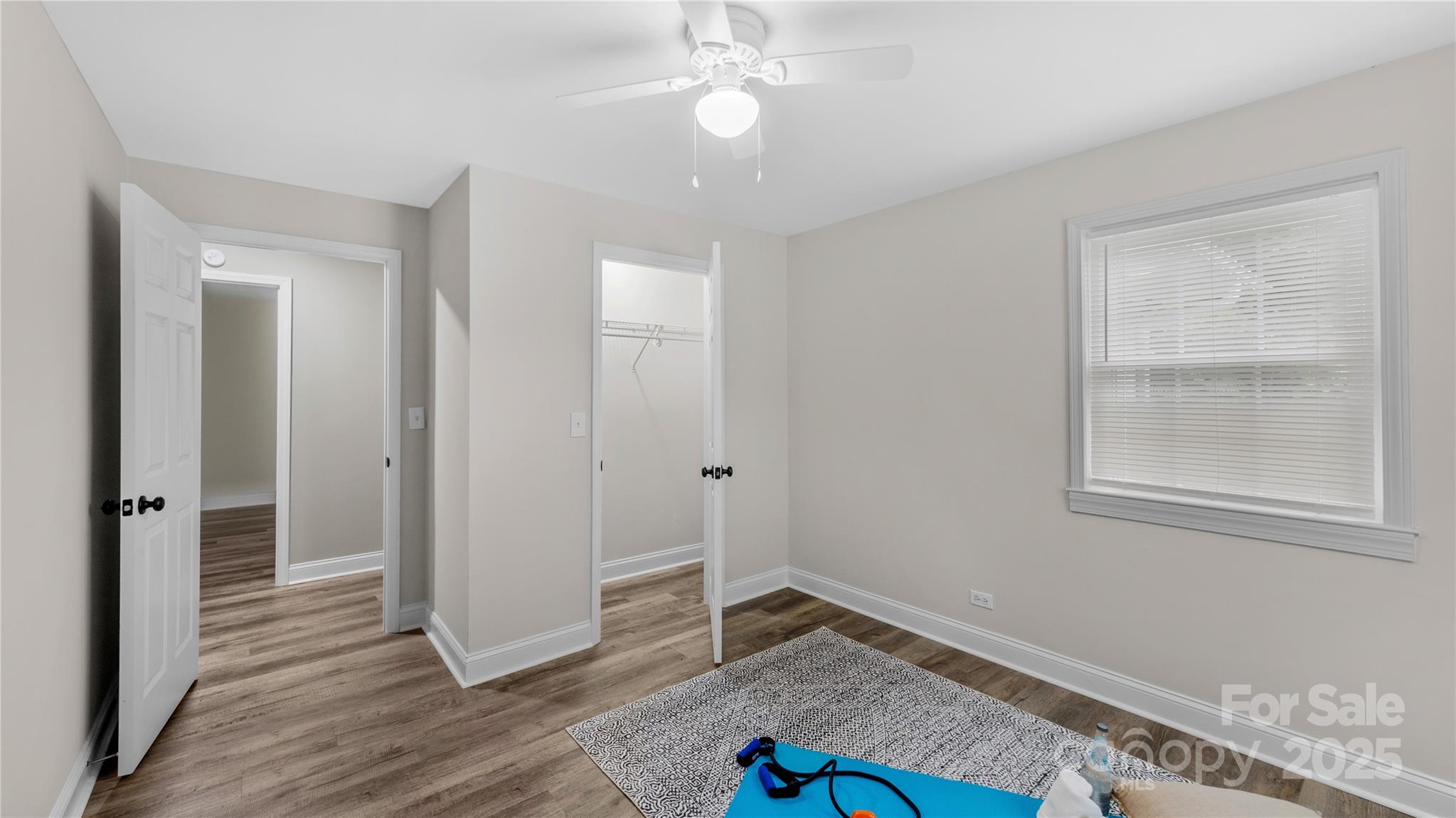 7860 Henry Harris Road Fort Mill, SC 29707 - Photo 22 of 31 wooden floor in an empty room with a window