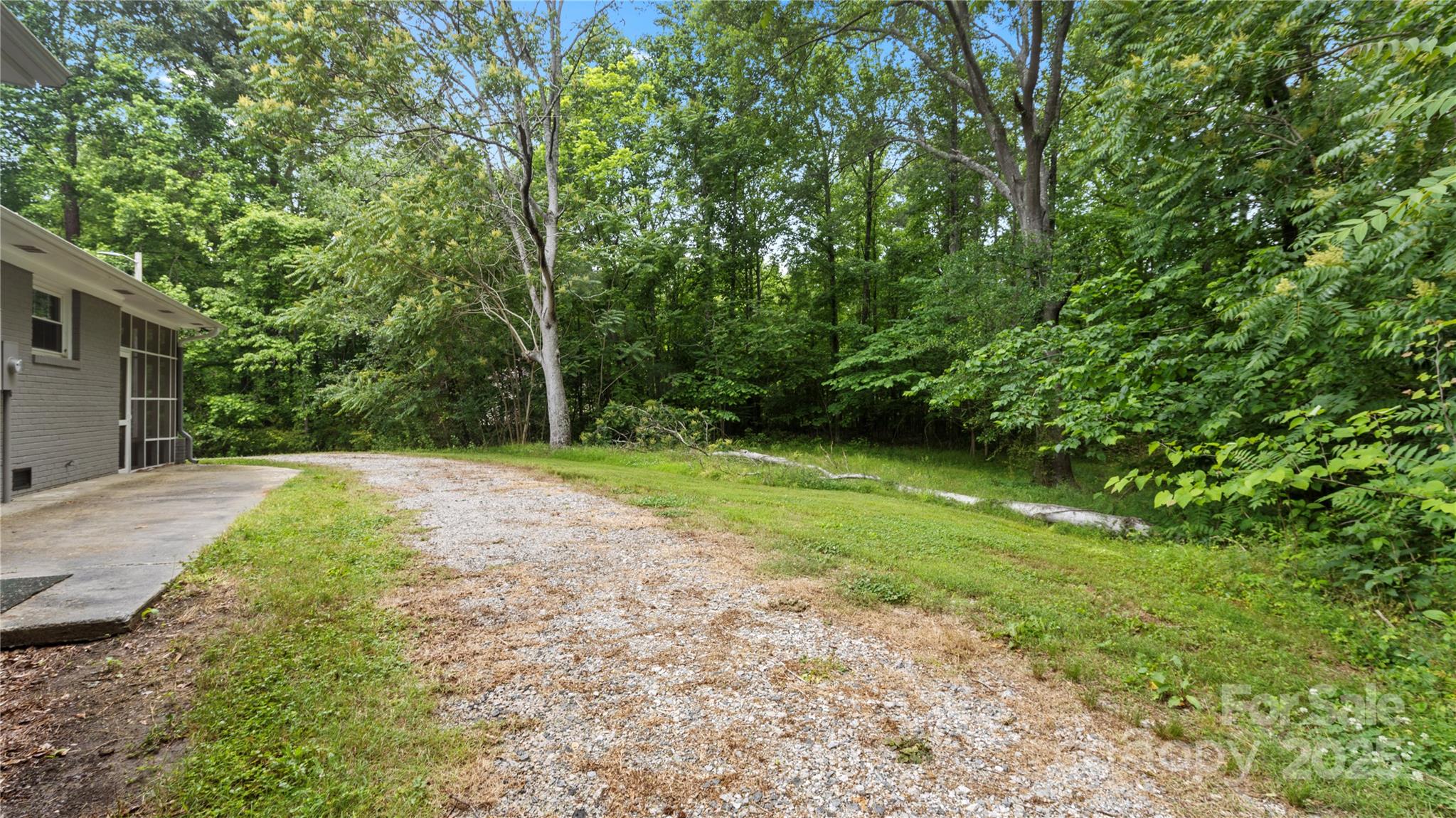 7860 Henry Harris Road Fort Mill, SC 29707 - Photo 25 of 31 a view of a yard with plants
