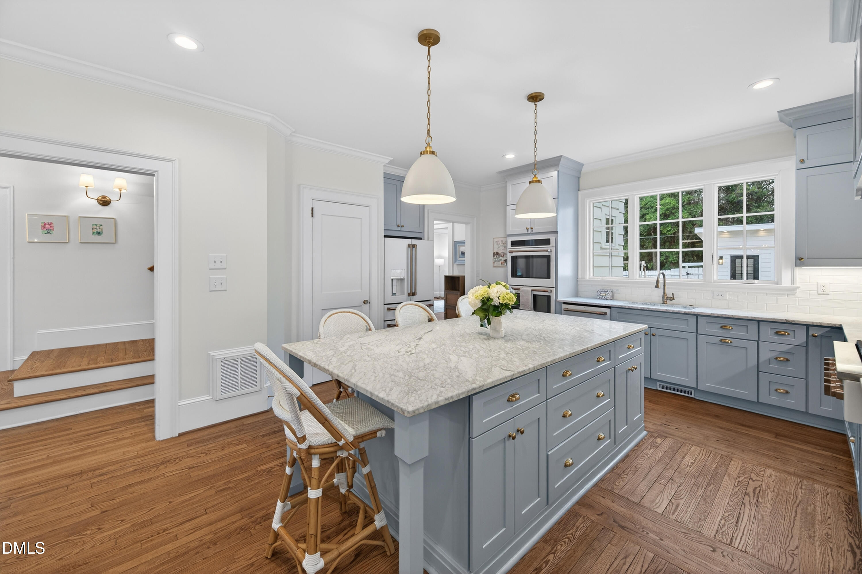 205 Woodburn Road Raleigh, NC 27605 - Photo 11 of 46 a kitchen with counter space and windows