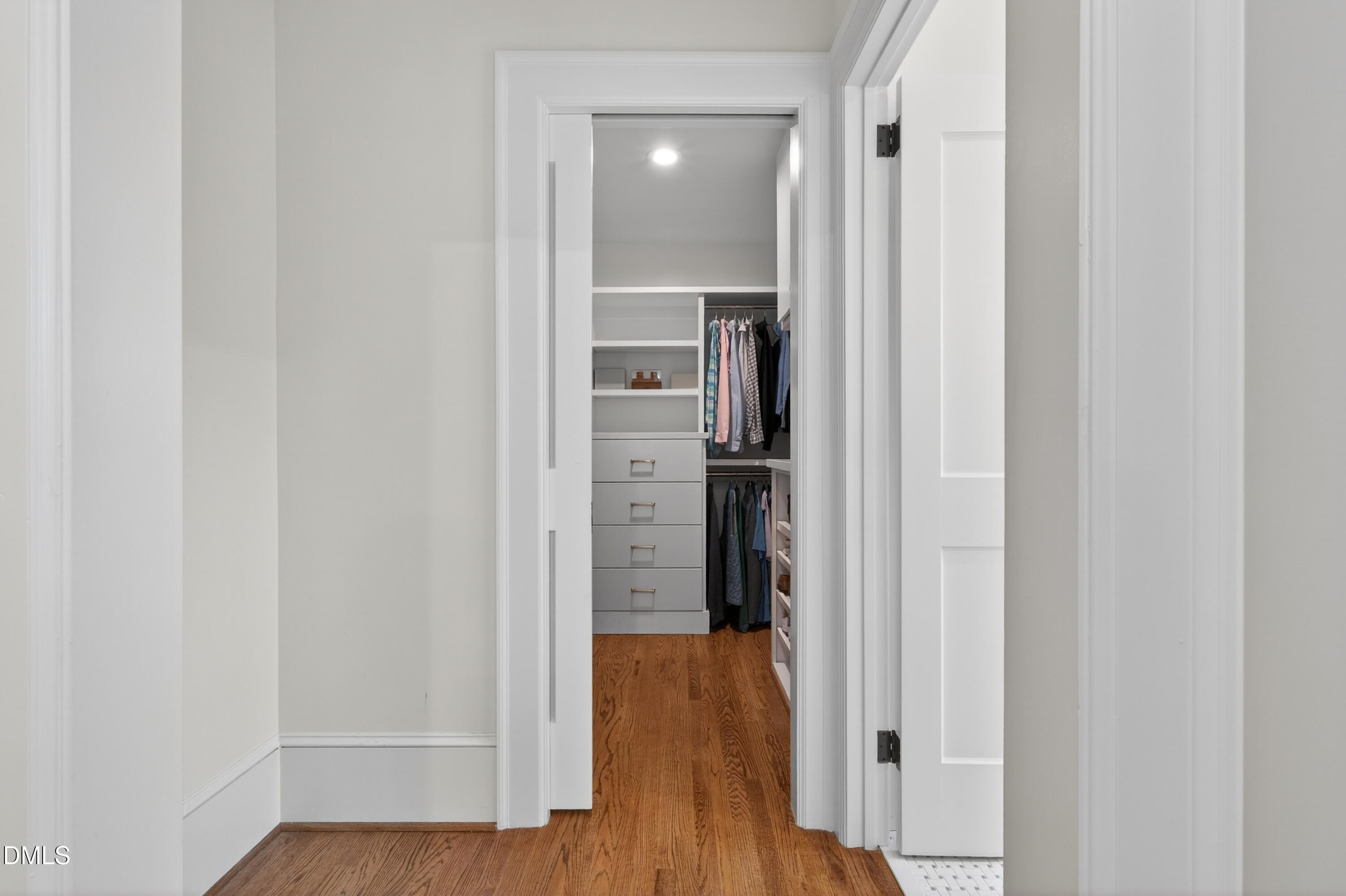 205 Woodburn Road Raleigh, NC 27605 - Photo 25 of 46 a view of a hallway with wooden floor