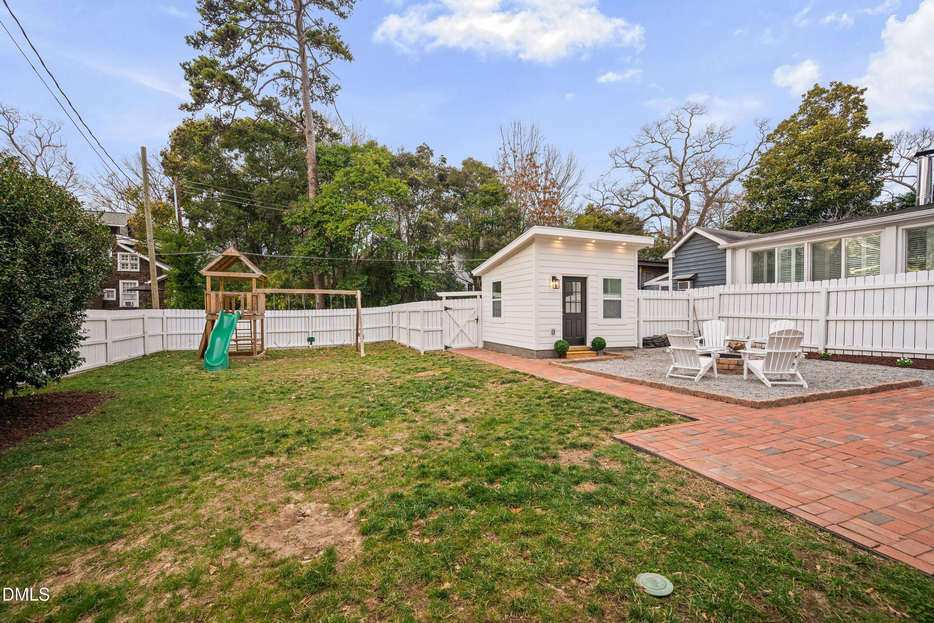 205 Woodburn Road Raleigh, NC 27605 - Photo 37 of 46 a view of a house with backyard and sitting area