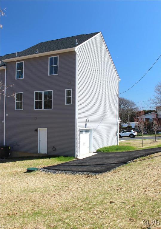 1604 Clauser Street Hellertown, PA 18055 - Photo 13 of 14 a view of a house with a swimming pool