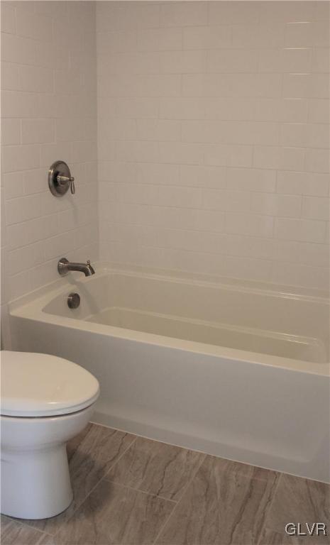 1604 Clauser Street Hellertown, PA 18055 - Photo 9 of 14 a bathroom with a toilet and a bathtub