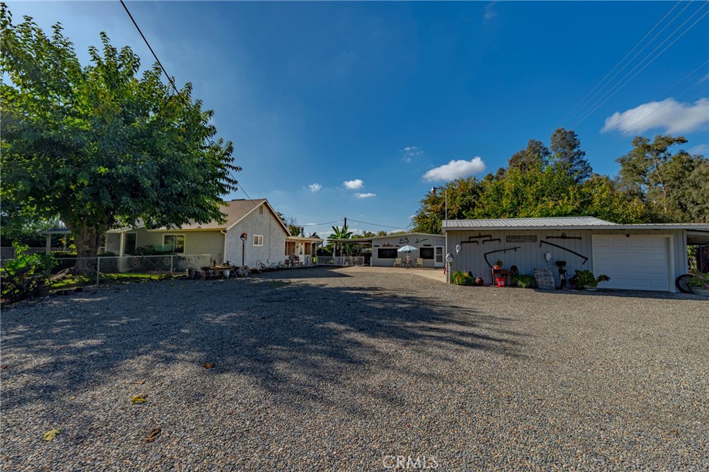4263 Gurr Road Atwater, CA 95301 - Photo 12 of 73 a view of a house with a yard and garage