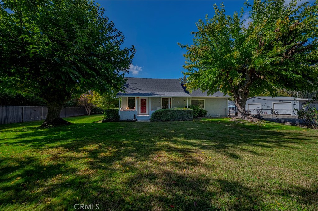 4263 Gurr Road Atwater, CA 95301 - Photo 14 of 73 a front view of a house with a yard