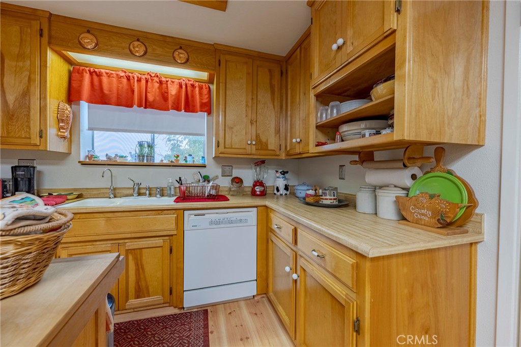 4263 Gurr Road Atwater, CA 95301 - Photo 29 of 73 a kitchen with stainless steel appliances granite countertop a sink and cabinets