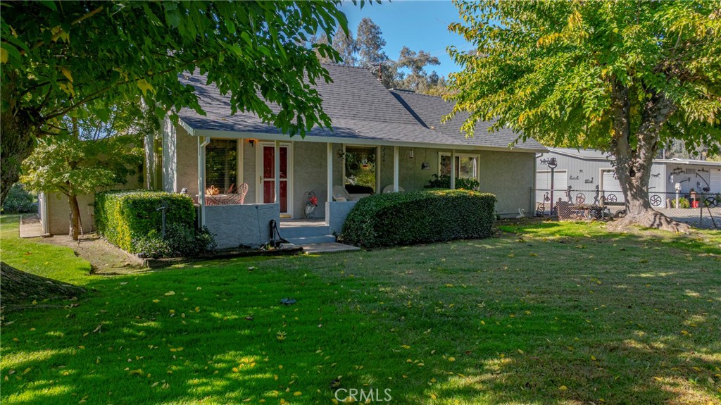 4263 Gurr Road Atwater, CA 95301 - Photo 3 of 73 a view of a house with a backyard and a patio