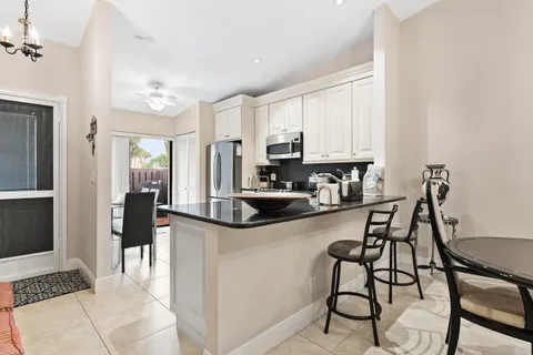 $299,000 | 823 Sky Pine Way, Unit D, Greenacres, FL 33415