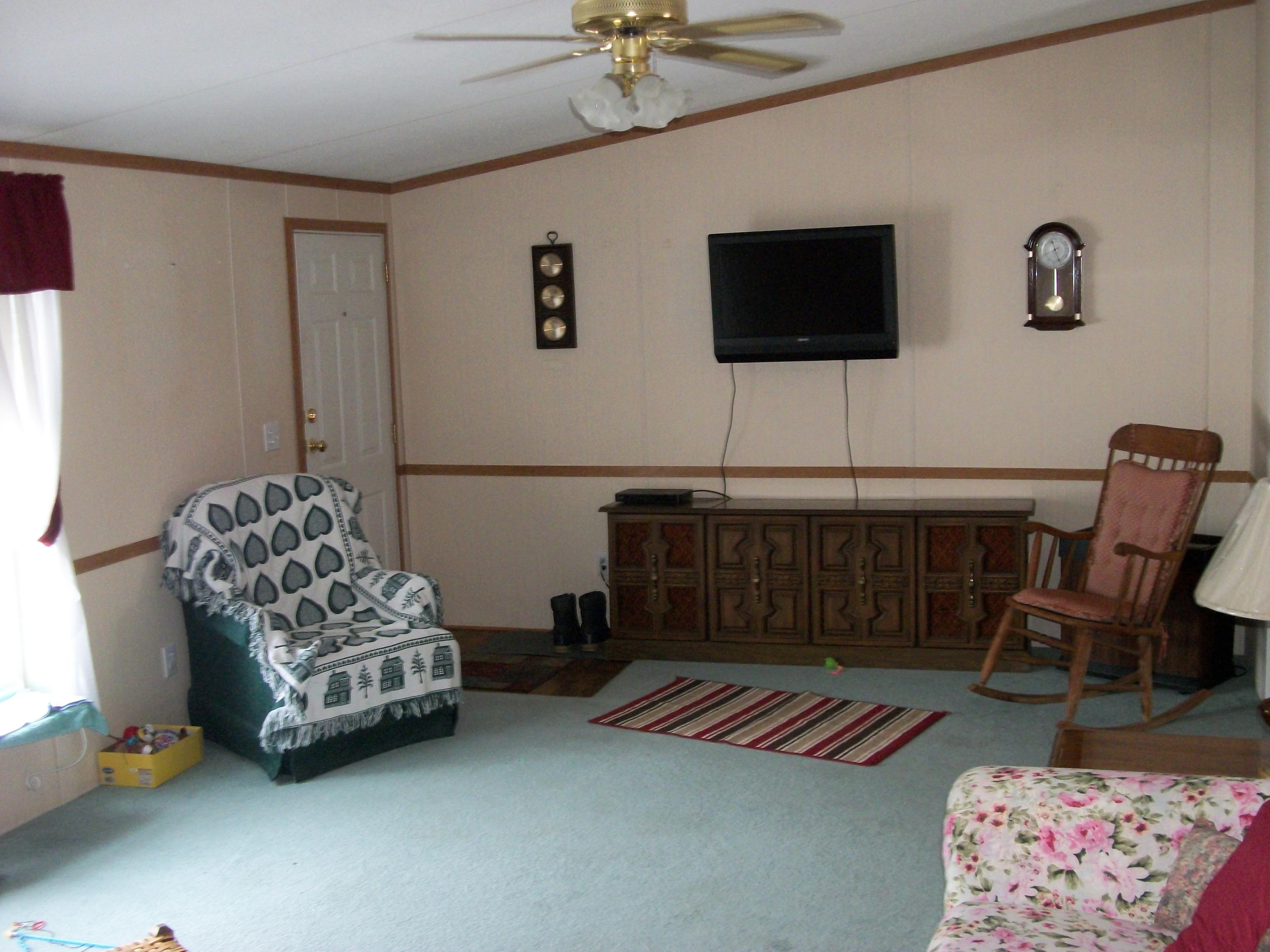 878 Dodlin Road Enfield, ME 04493 - Photo 19 of 49 Living room, front entry