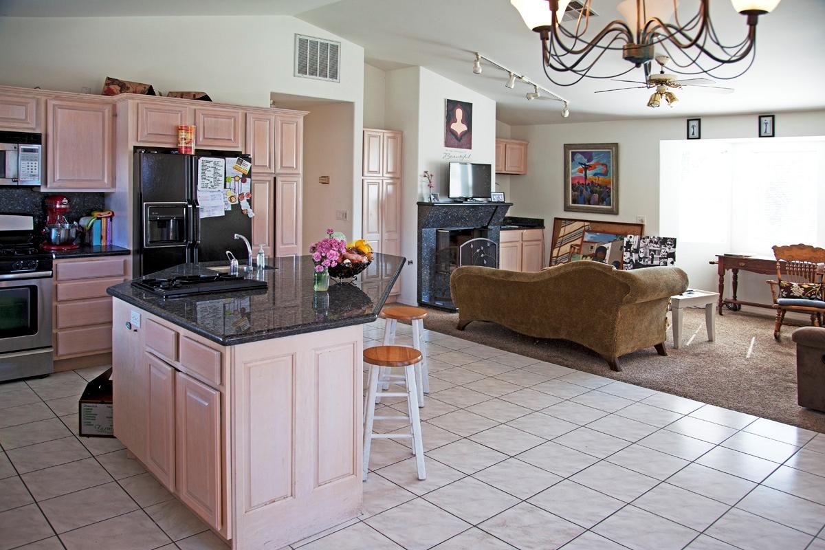 4854 8th Street Carpinteria, CA 93013 - Photo 3 of 8 a kitchen with cabinets and chairs