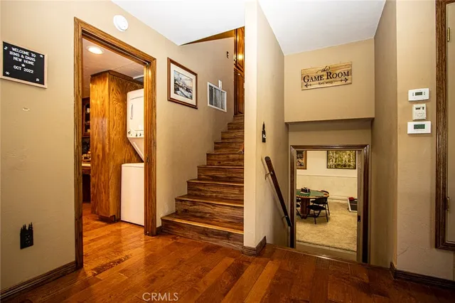 a view of a hardwood & utility room