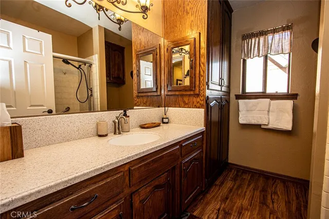a white toilet sitting next to a window