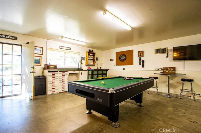 a kitchen with a sink cabinets and window