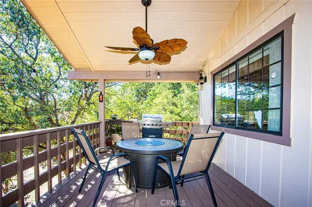 a view of a chairs and table in a patio