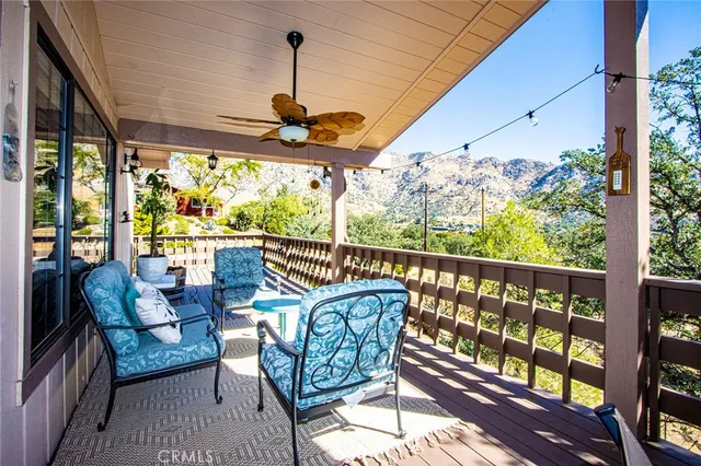a view of a chairs and tables in the patio