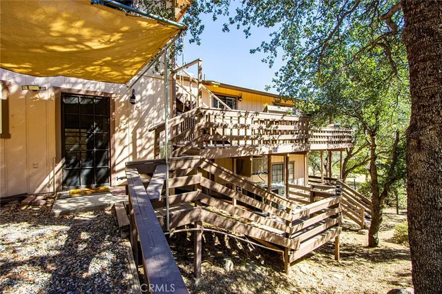 a view of a chairs and table on the terrace
