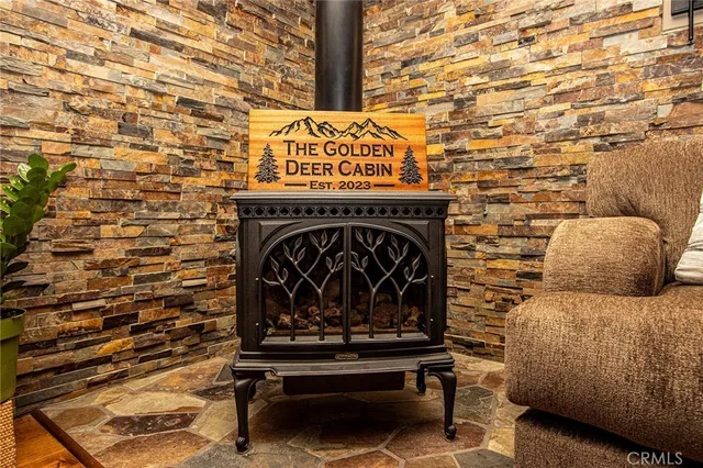 a view of fireplace and wooden floor