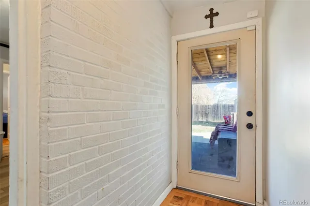 a view of a bathroom from a hallway