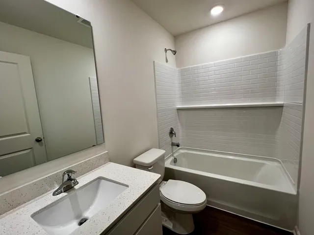 a bathroom with a sink and a bathtub