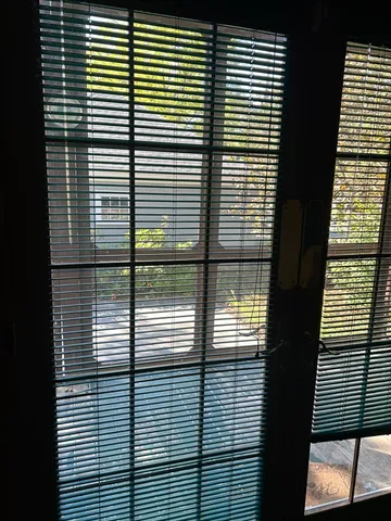 a view of a balcony with a door