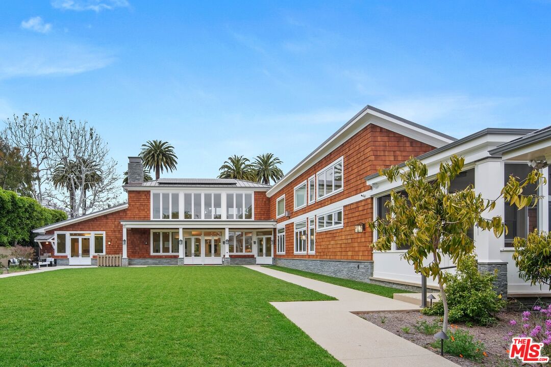 306 Georgina Avenue Santa Monica, CA 90402 - Photo 1 of 1 a front view of a house with a garden