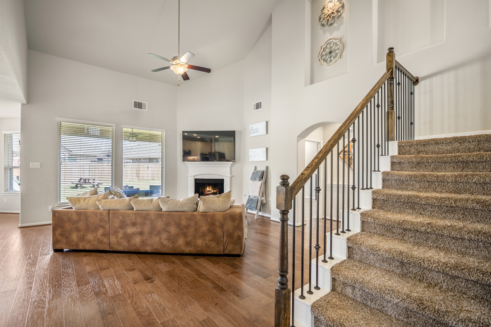 23006 Mulberry Tree Lane Spring, TX 77389 - Photo 11 of 50 a living room with furniture and a chandelier